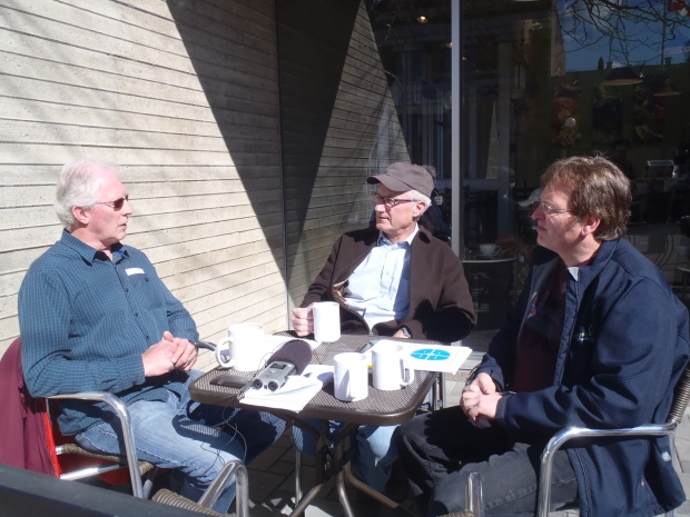 Brad Harrison, the Armchair Mayor and Randy Sunderman  (left to right) enjoy a break in the rain.